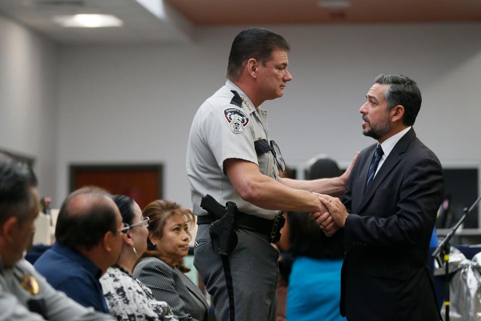 El Paso Sheriff Richard Wiles and State Sen. César J. Blanco attend the Del Valle Middle School library dedication ceremony for deputy Peter John Herrera, Wednesday, Oct. 27, 2021. Herrera was killed in the line of duty. He died on March 24, 2019, two days after he was shot.