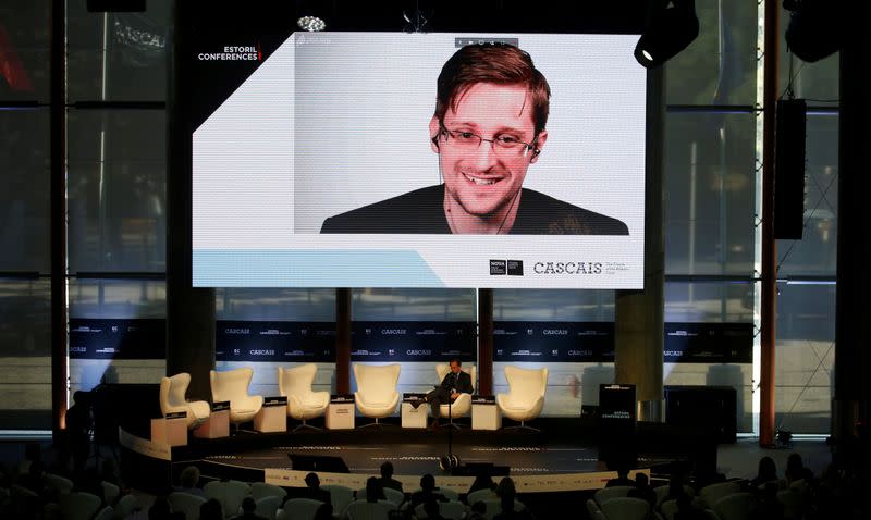 FILE PHOTO: Edward Snowden speaks via video link during the Estoril Conferences in Estoril