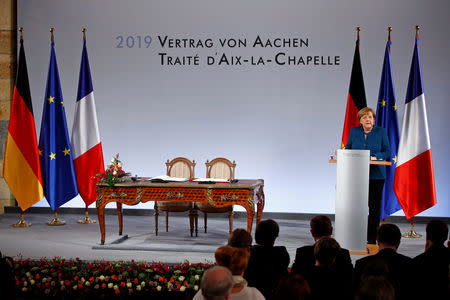 German Chancellor Angela Merkel speaks during a signing of a new agreement on bilateral cooperation and integration, known as Treaty of Aachen, in Aachen, Germany, January 22, 2019. REUTERS/Wolfgang Rattay