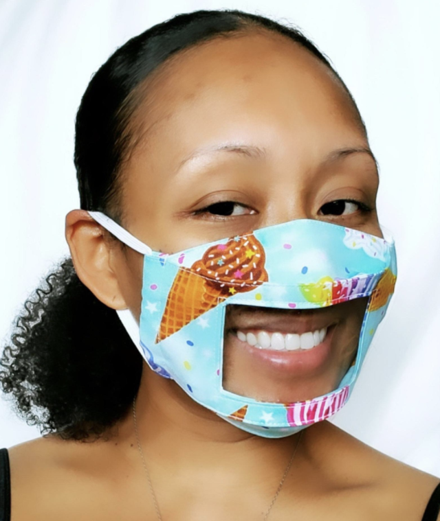 College student makes face masks with plastic window for deaf and