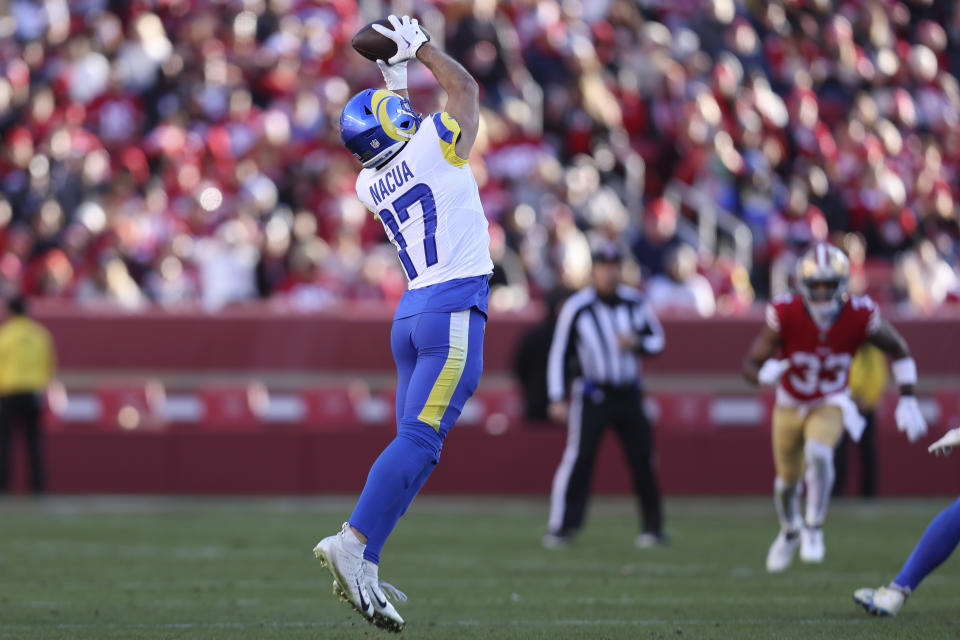 Los Angeles Rams wide receiver Puka Nacua (17) catches a pass against the San Francisco 49ers during the second half of an NFL football game in Santa Clara, Calif., Sunday, Jan. 7, 2024. Nacua set a rookie record for receptions on this play. (AP Photo/Jed Jacobsohn)