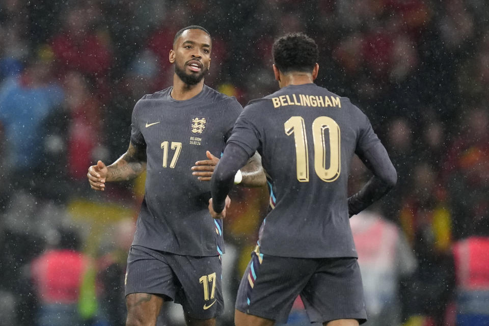 England's Ivan Toney, left, celebrates with his teammate Jude Bellingham after scoring his side's opening goal during an international friendly soccer match between England and Belgium at Wembley Stadium, in London, Tuesday, March 26, 2024. (AP Photo/Kirsty Wigglesworth)