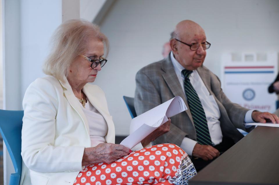 Bobbie Holsclaw, left, chair of the Jefferson County Board of Elections, looked over election results for the county as Democtratic representative Carl Bensinger looked on at right on June 30, 2020.  They were at the Election Center in Louisville, Ky. to certify the results.