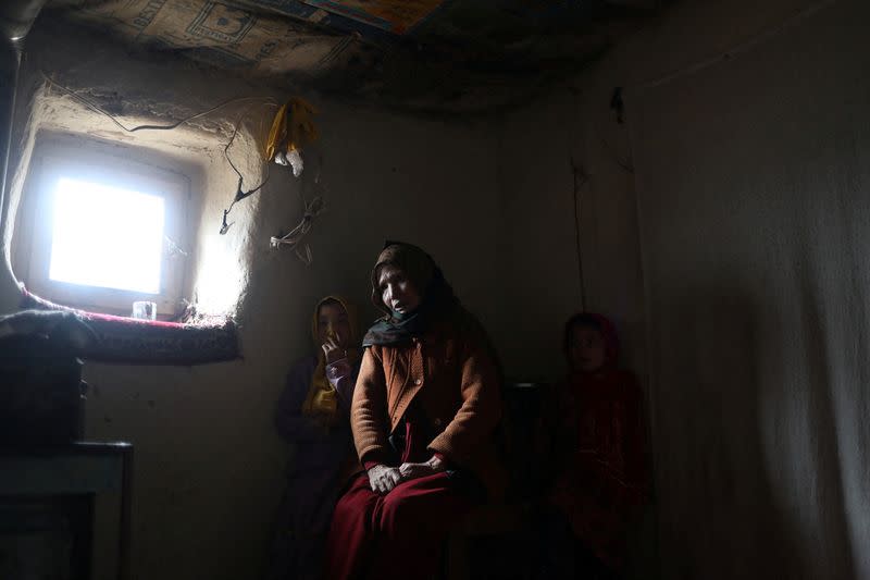 The Wider Image: For struggling Afghan family, the next meal is a matter of faith