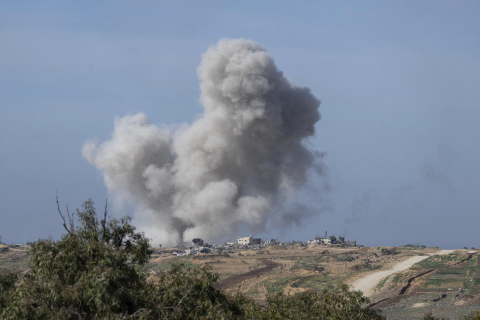Smoke rises following an Israeli bombardment in the Gaza Strip, as seen from southern Israel, Thursday, Jan.18, 2024. The army is battling Palestinian militants across Gaza in the war ignited by Hamas' Oct. 7 attack on Israel. (AP Photo/Ohad Zwigenberg)