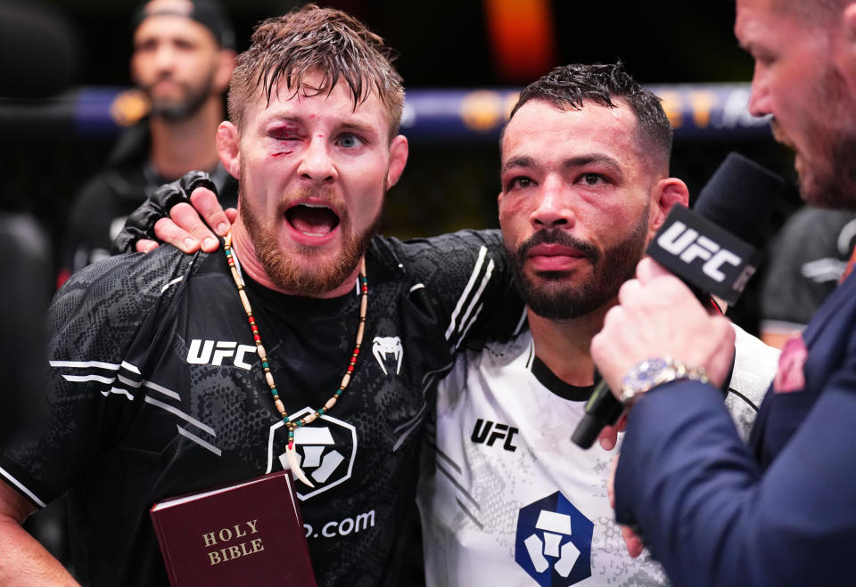 Bryce Mitchell (left) and Dan Ige embraced after their featherweight fight during the UFC Vegas 79 on September 23, 2023 in Las Vegas, Nevada. (Photo by Chris Unger/Zuffa LLC via Getty Images)