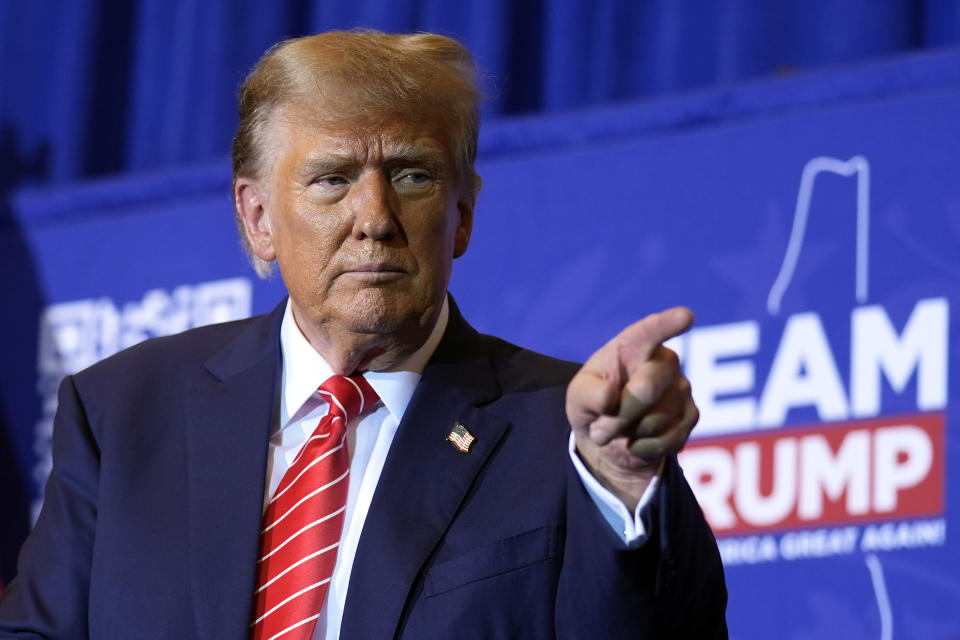 Republican presidential candidate former President Donald Trump gestures after speaking at a campaign event in Concord, N.H., Friday, Jan. 19, 2024. (AP Photo/Matt Rourke)