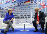 <p>President Trump looks toward German Chancellor Angela Merkel during their bilateral meeting, Wednesday, July 11, 2018, in Brussels. (Photo: Pablo Martinez Monsivais/AP) </p>