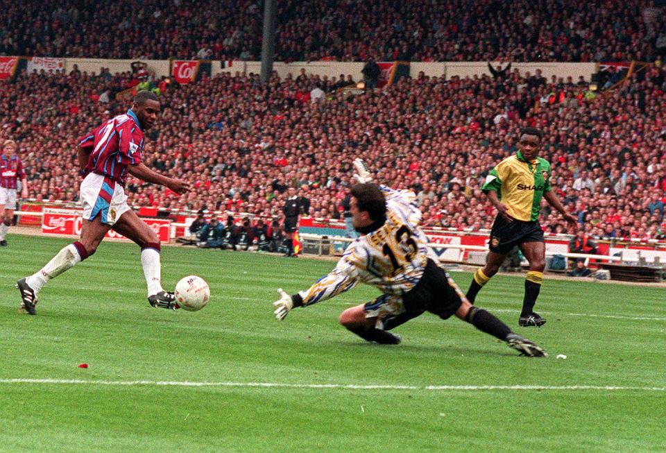 Manchester United goalkeeper Les Sealey dives in vain as Dalian Atkinson scores the 1st goal for Aston Villa in the Coca Cola Cup Final at Wembley.   (Photo by Tony Harris - PA Images/PA Images via Getty Images)