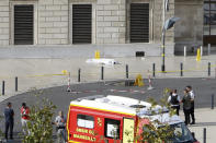 <p>A body lies under a white sheet outside Marseille ‘s main train station, Oct. 1, 2017 in Marseille, southern France. A man with a knife attacked people at the main train station in the southeastern French city of Marseille on Sunday, killing two women before soldiers fatally shot the assailant, officials said. (AP Photo/Claude Paris) </p>