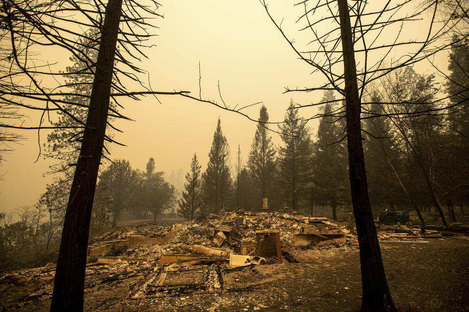 A home leveled by the Delta Fire rests in a clearing in Pollard Flat area of the Shasta-Trinity National Forest, Calif., on Thursday, Sept. 6, 2018. (AP Photo/Noah Berger)