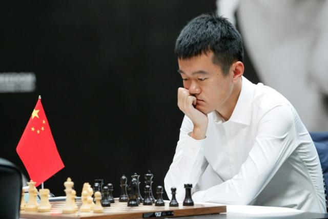 Ding Liren, 30, described the moment his opponent resigned the final game as 'very emotional'
