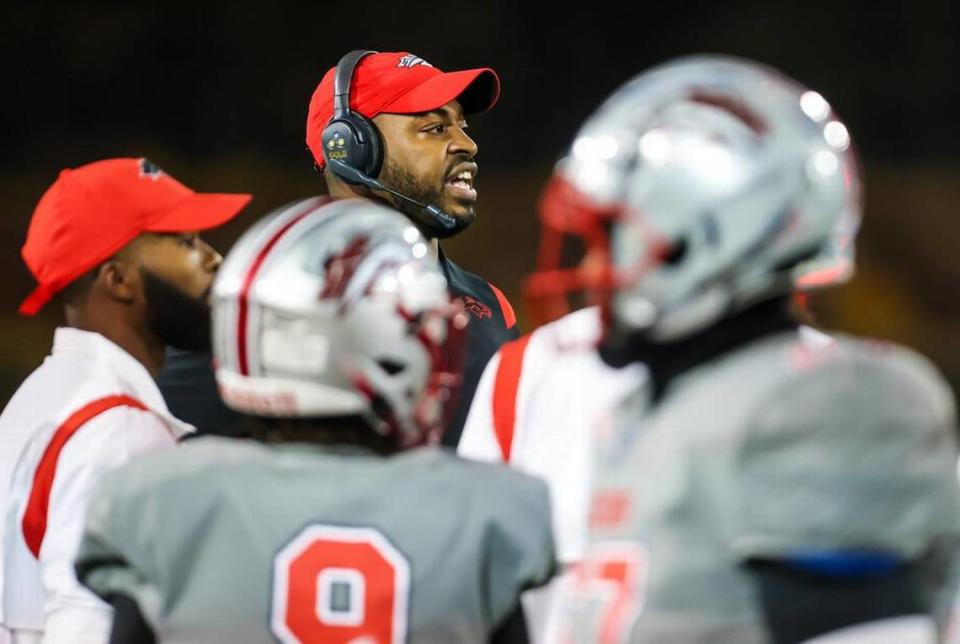 South Pointe Stallions head coach DeVonte’ Holloman directs his team against the Beaufort Eagles in the Class 4A SC State Championship Game at Benedict College in Columbia, SC, Thursday night, December 2, 2021.