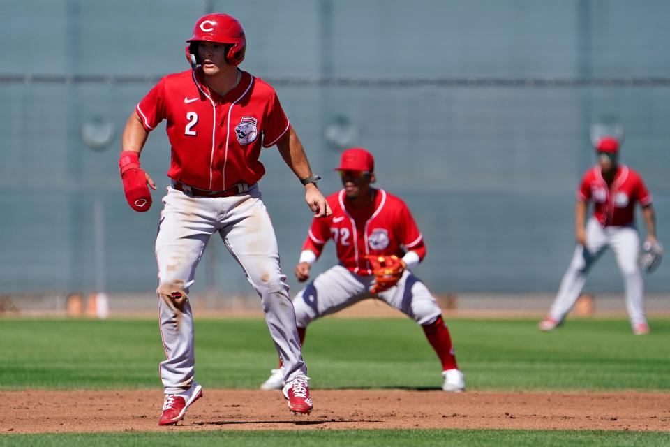 Cincinnati Reds minor league infielder Tyler Callihan leads off second base during a scrimmage, Tuesday, March 15, 2022, at the baseball team's spring training facility in Goodyear, Ariz.