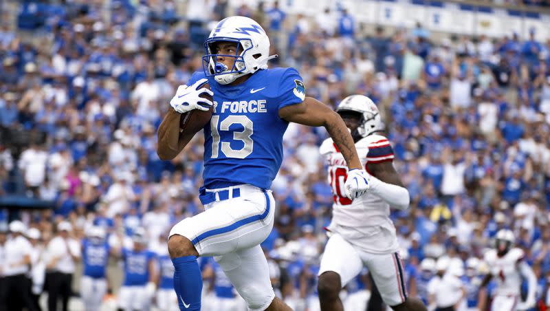 Air Force Falcons wide receiver Jared Roznos (13) runs in a touchdown during an NCAA football game on Saturday, Sept. 2, 2023, at Air Force Academy, Colo.