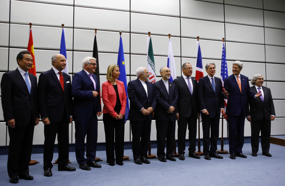 From left: Chinese Foreign Minister Wang Yi, French Foreign Minister Laurent Fabius, German Foreign Minister Frank-Walter Steinmeier, <span>High Representative of the Union for Foreign Affairs and Security Policy</span> Federica Mogherini, Iranian Foreign Minister Mohammad Javad Zarif, Head of the Iranian Atomic Energy Organization Ali Akbar Salehi, Russian Foreign Minister Sergey Lavrov, British Foreign Secretary Philip Hammond, U.S. Secretary of State John Kerry and U.S. Secretary of Energy Ernest Moniz pose for a group picture at the United Nations building in Vienna, July 14, 2015. Iran and six major world powers reached a nuclear deal, capping more than a decade of on-off negotiations with an agreement that could potentially transform the Middle East and which Israel called an “historic surrender.” (Photo: Leonhard Foeger/Reuters)