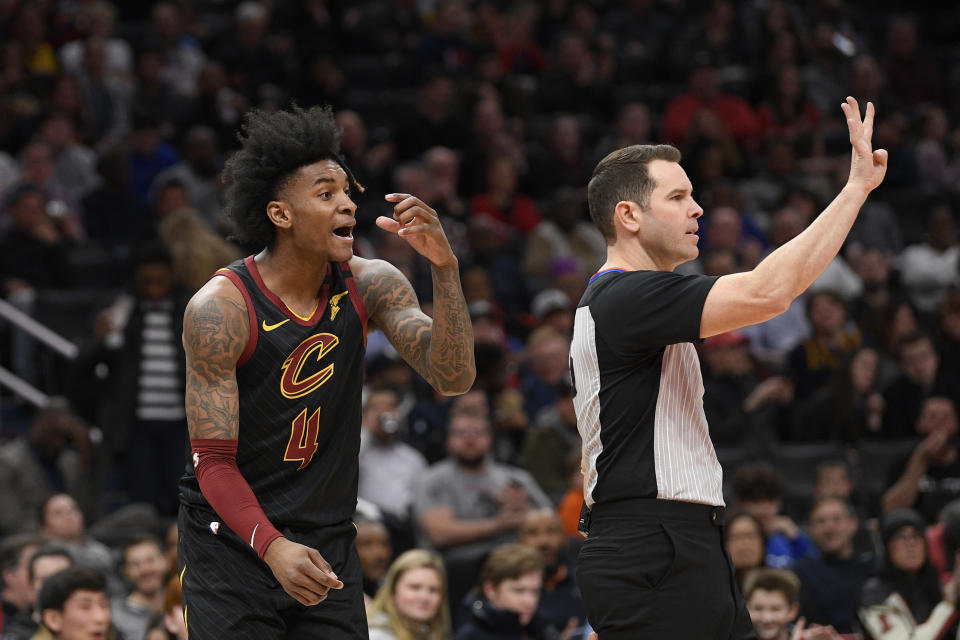 Cleveland Cavaliers guard Kevin Porter Jr. (4) reacts after he was called for a foul during the first half of the team's NBA basketball game against the Washington Wizards, Friday, Feb. 21, 2020, in Washington. (AP Photo/Nick Wass)