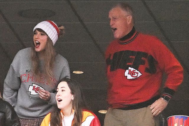 <p>Kathryn Riley/Getty</p> Brittany Mahomes (back row 2nd L), Taylor Swift, and Scott Swift cheer while watching the game between the Kansas City Chiefs and New England Patriots at Gillette Stadium on December 17, 2023 in Foxboro, Massachusetts.