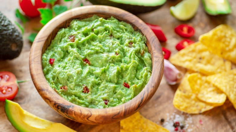 Guacamole in wooden bowl