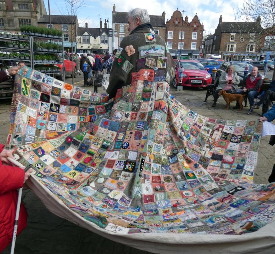 Darlington and Stockton Times: The Coat of Hopes on display in Thirsk Market Place