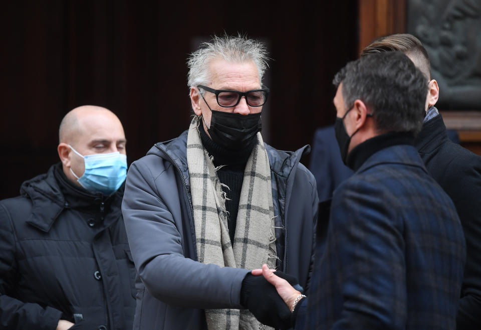 Soccer Football - Funeral for former Italy player Paolo Rossi - Vicenza Cathedral, Vicenza, Italy - December 12, 2020 Former Italy player Stefano Tacconi with Paolo Maldini before the start of the funeral REUTERS/Daniele Mascolo