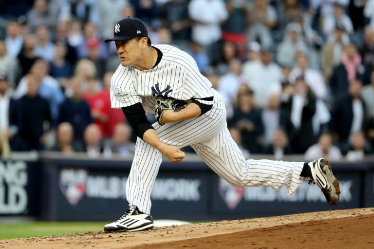 Masahiro Tanaka of the New York Yankees throws a pitch against the Houston Astros during the second inning in Game Five of the American League Championship Series, at Yankee Stadium in New York, on October 18, 2017