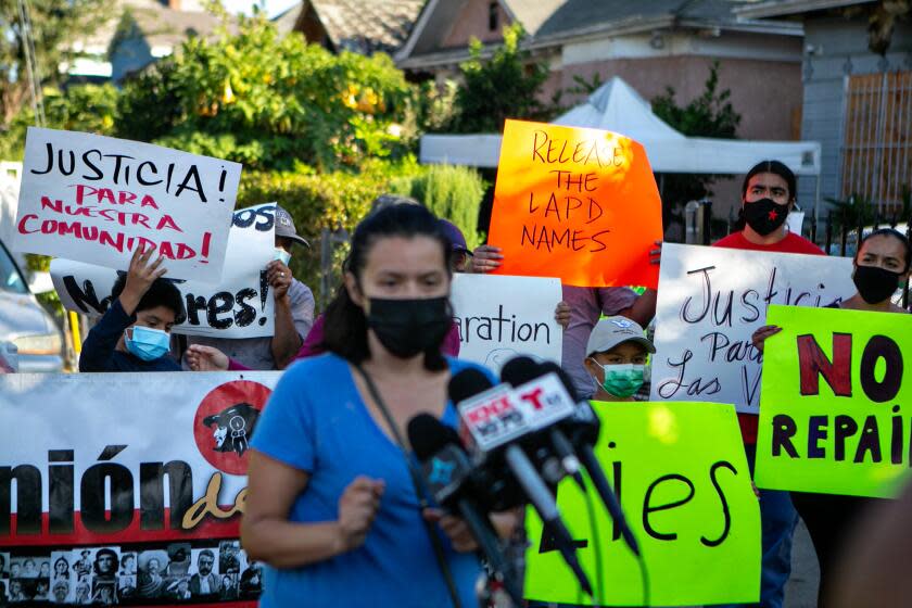 LOS ANGELES, CA - SEPTEMBER 16: Maria Velazquez speaks news conference in front of her homes to protest the city's handling of the June 30 LAPD fireworks explosion that damaged many local homes on Thursday, Sept. 16, 2021 in Los Angeles, CA.(Jason Armond / Los Angeles Times)