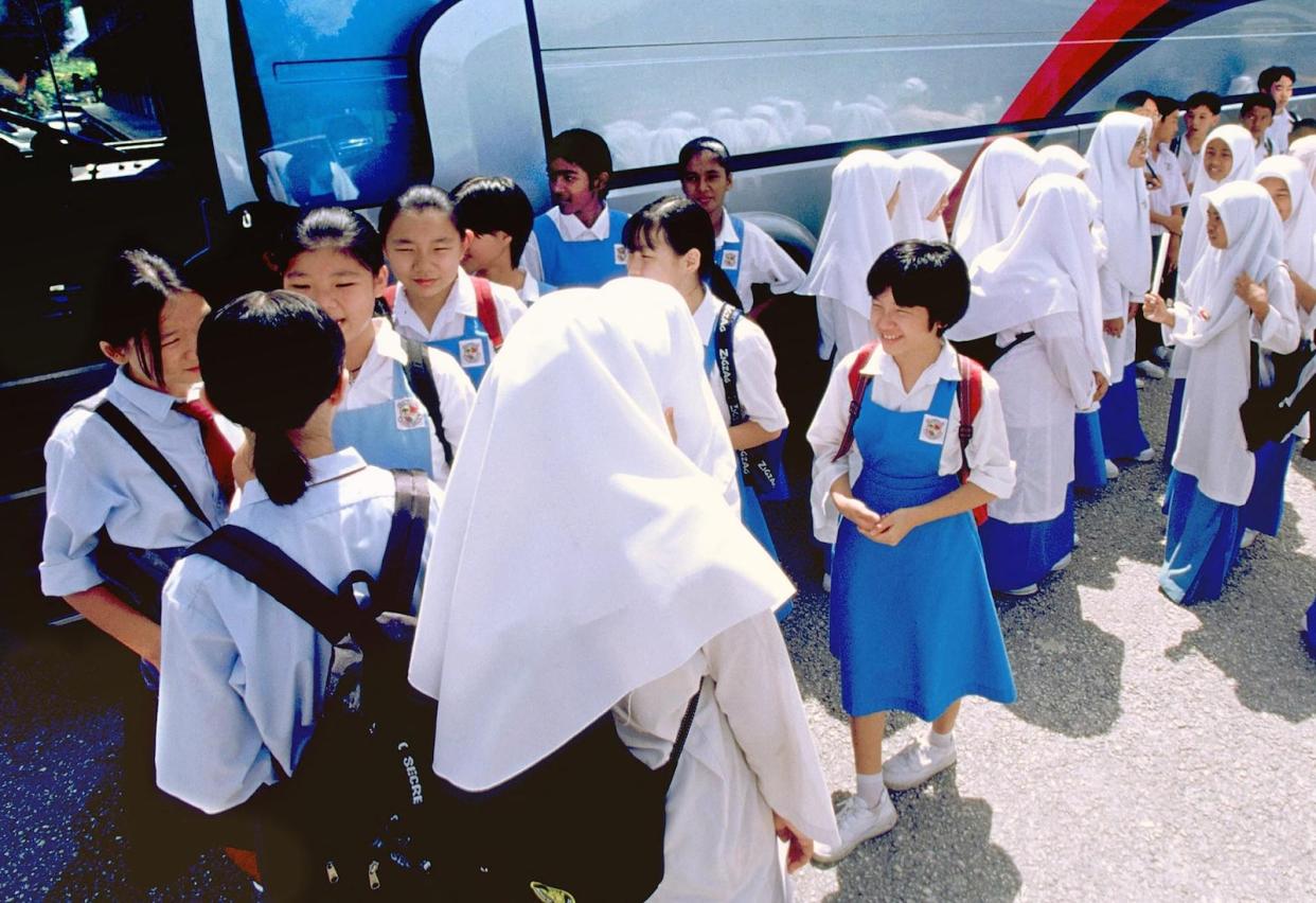 A photo of multiracial secondary school students in Malaysia, including Chinese, Indians and Malays