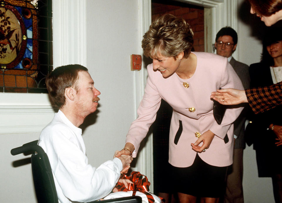 Princess Diana shakes hands with a resident of the Casey House, an AIDS hospice house in Toronto, 1991.<span class="copyright">Tim Graham Photo Library/Getty Images</span>