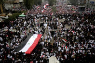 Followers of Shiite cleric Muqtada al-Sadr gather in Baghdad, Iraq, Friday, Jan. 24, 2020. Thousands of supporters of an influential, radical Shiite cleric gathered Friday in central Baghdad for a rally to demand that American troops leave the country amid heightened anti-US sentiment after a drone strike ordered by Washington earlier this month killed a top Iranian general in the Iraqi capital. (AP Photo)