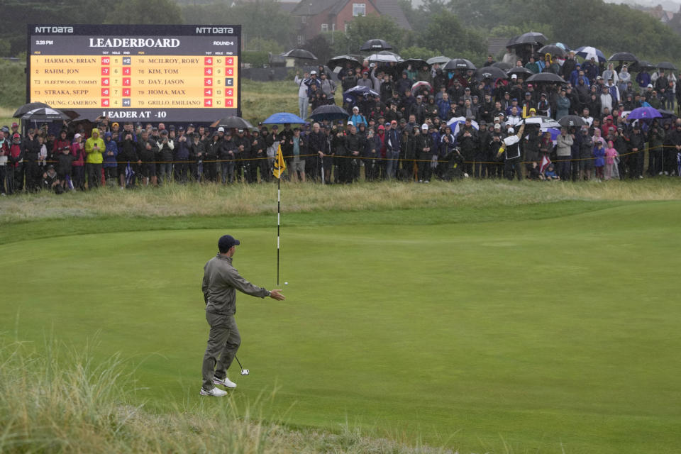 Northern Ireland's Rory McIlroy reacts after putting on the 10th green during the final day of the British Open Golf Championships at the Royal Liverpool Golf Club in Hoylake, England, Sunday, July 23, 2023. (AP Photo/Kin Cheung)