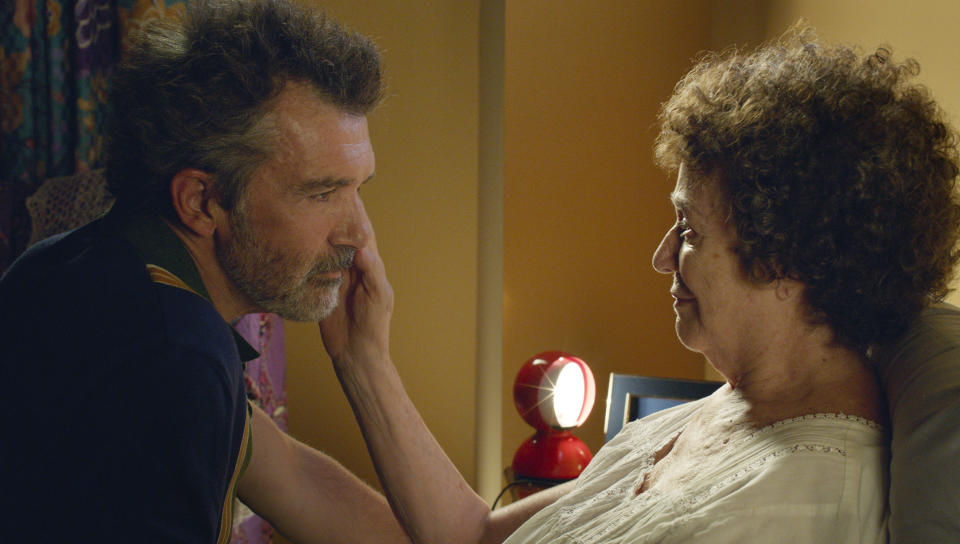 This image released by Sony Pictures Classics shows Antonio Banderas, left, and Julieta Serrano in a scene from "Pain and Glory." On Monday, Dec. 9, 2019, the film was nominated for a Golden Globe for best motion picture in a foreign language. Banderas was also nominated for an Oscar for leading actor. (Manolo Pavón/Sony Pictures Classics via AP)