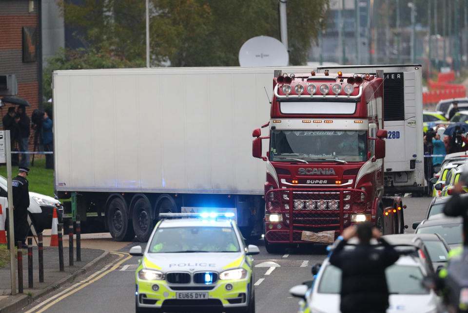 File photo dated 23/10/2019 of the container lorry where 39 people were found dead inside leaving Waterglade Industrial Park in Grays, Essex. Maurice Robinson, 25, has been charged with 39 counts of manslaughter and conspiracy to traffic people over the Grays lorry trailer deaths, Essex Police said.
