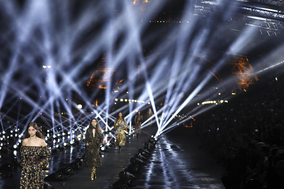 Models wear creations as part of the Saint Laurent Ready To Wear Spring-Summer 2020 collection, unveiled during the fashion week, in Paris, Tuesday, Sept. 24, 2019. (Photo by Vianney Le Caer/Invision/AP)