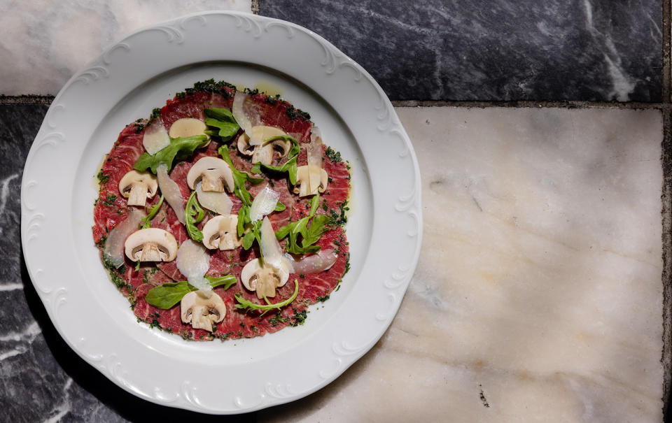 The beef carpaccio, made with white button mushrooms, parmigiano and black truffle vinaigrette, is a new addition to the menu at Lavo Ristorante.<br>