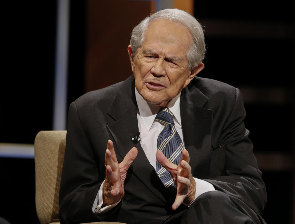 FILE - Rev. Pat Robertson gestures during a Presidential candidate forum at Regent University in Virginia Beach, Va., on Oct. 23, 2015. Robertson died Thursday, June 8, 2023. (AP Photo/Steve Helber, File)