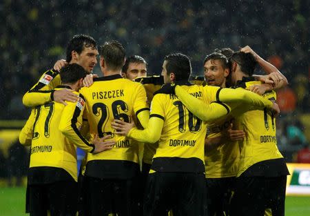 Football Soccer - Borussia Dortmund v FC Ingolstadt - German Bundesliga - Signal Iduna Park, Dortmund , 30/01/16 Borussia Dortmund's players celebrate a goal. REUTERS/Ina Fassbender