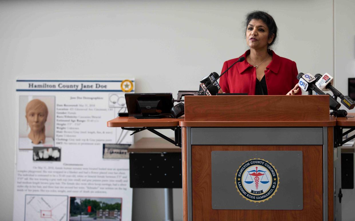 Hamilton County Coroner Dr. Lakshmi Sammarco holds a news conference at the Hamilton County Coroner and Crime Lab in Blue Ash, Nov. 8, 2021. She was requesting the public's help in identifying three women found dead but who have yet to be identified. The oldest case is from 2018.