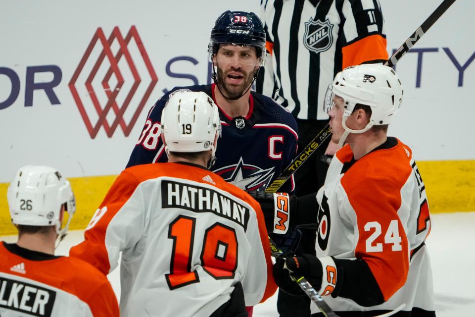 Oct 12, 2023; Columbus, Ohio, USA; Columbus Blue Jackets center Boone Jenner (38) exchanges words with Philadelphia Flyers right wing Garnet Hathaway (19) during the second period of the NHL hockey game at Nationwide Arena.