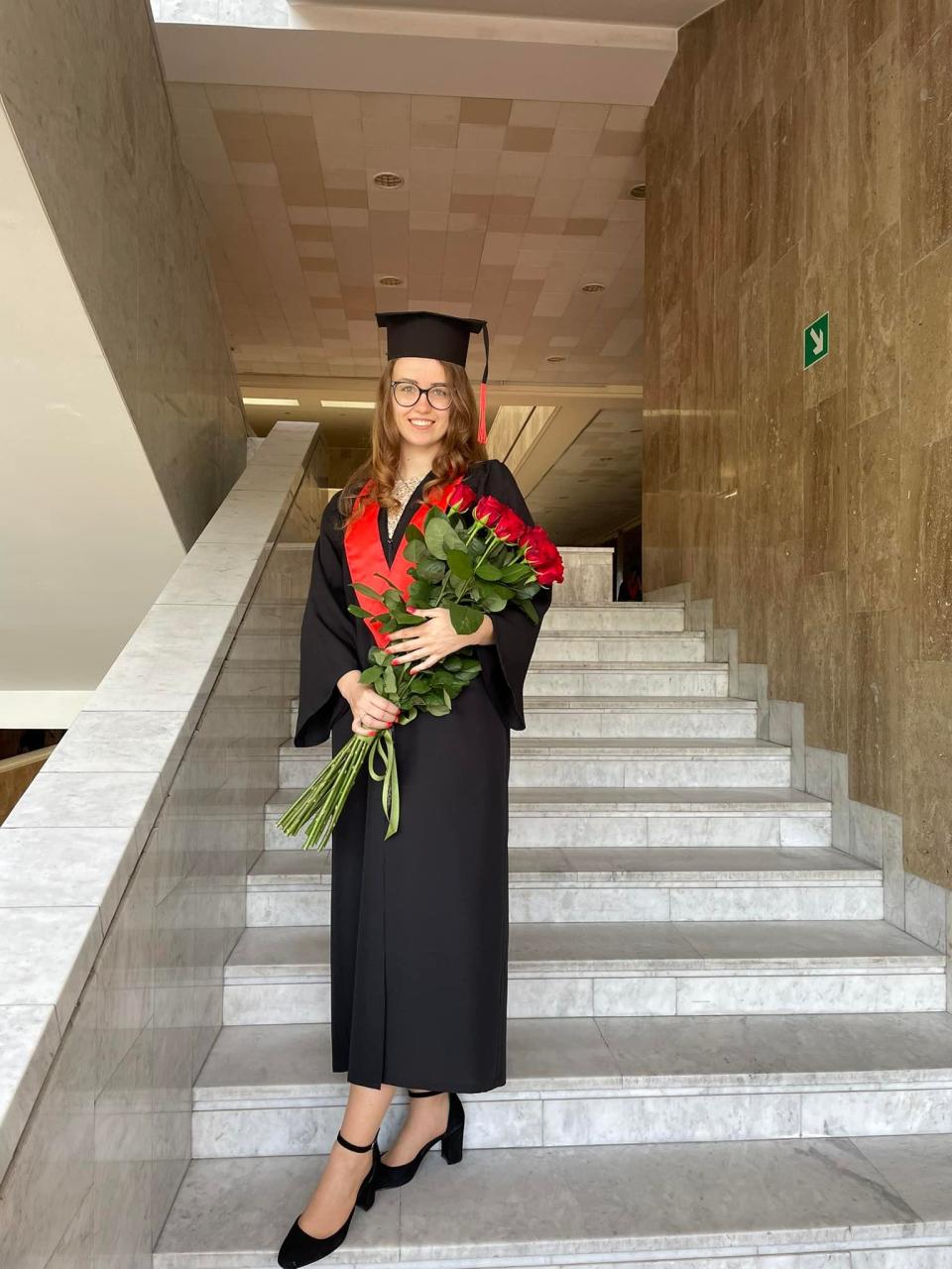 Ukrainian citizen and former Apponequet Regional High School exchange student Kateryna Solodovnyk poses for a graduation photo at Taras Shevchenko National University of Kyiv, where she graduated, with distinction, on June 20 with her Master's Degree in International Law. Only four months prior, Solodovnyk and her fiancee were fleeing Kyiv to escape the onslaught of invading Russian military forces.