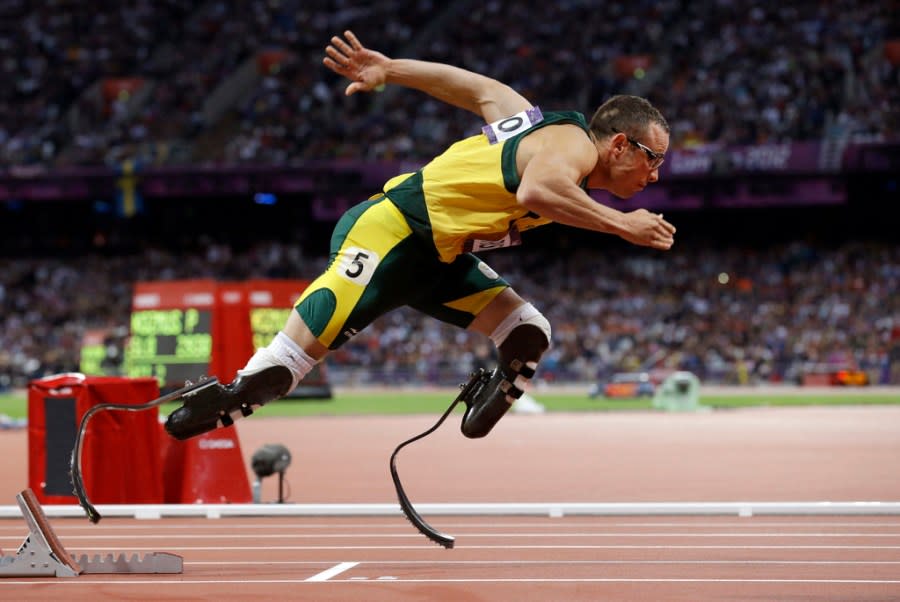 FILE – In this Sunday, Aug. 5, 2012 file photo South Africa’s Oscar Pistorius starts in the men’s semi-finals of the 400-meter in the Olympic Stadium at the 2012 Summer Olympics, London. Pistorius could be granted parole on Friday, Nov. 24, 2023 after nearly 10 years in prison for killing his girlfriend. The double-amputee Olympic runner was convicted of a charge comparable to third-degree murder for shooting Reeva Steenkamp in his home in 2013. He has been in prison since late 2014. (AP Photo/Anja Niedringhaus, File)