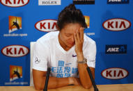 Li Na of China attends a news conference after being defeated by Victoria Azarenka of Belarus in their women's singles final match at the Australian Open tennis tournament in Melbourne, January 26, 2013. REUTERS/Navesh Chitrakar (AUSTRALIA - Tags: SPORT TENNIS) - RTR3CZCR