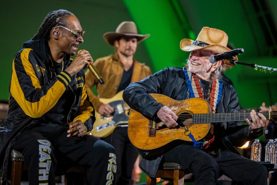 Snoop Dogg and Willie Nelson perform Saturday, April 29, 2023, at "Long Story Short: Willie Nelson at 90" at the Hollywood Bowl. They sang Willie's "Roll Me Up and Smoke Me When I Die."