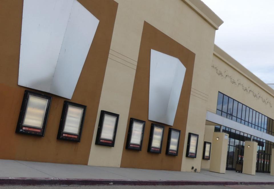 Signs posted on locked doors and empty movie poster holders told visitors that the AMC Classic Apple Valley 14 movie theatre had permanently closed.