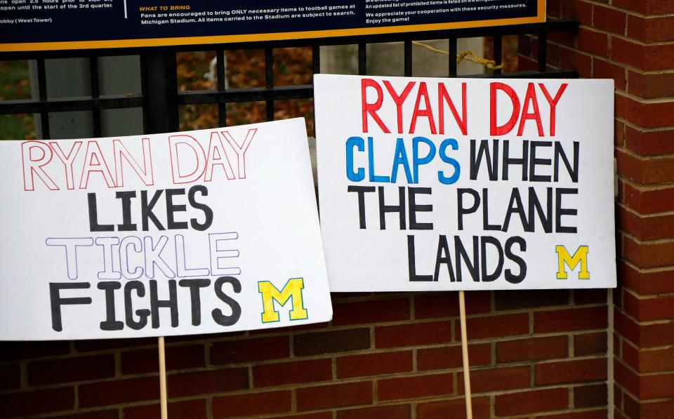 Michigan Stadium posters hang along a fence outside Michigan Stadium before the Buckeyes take on the Michigan Wolverines at Michigan Stadium at Ann Arbor, Mi on November  27, 2021. 