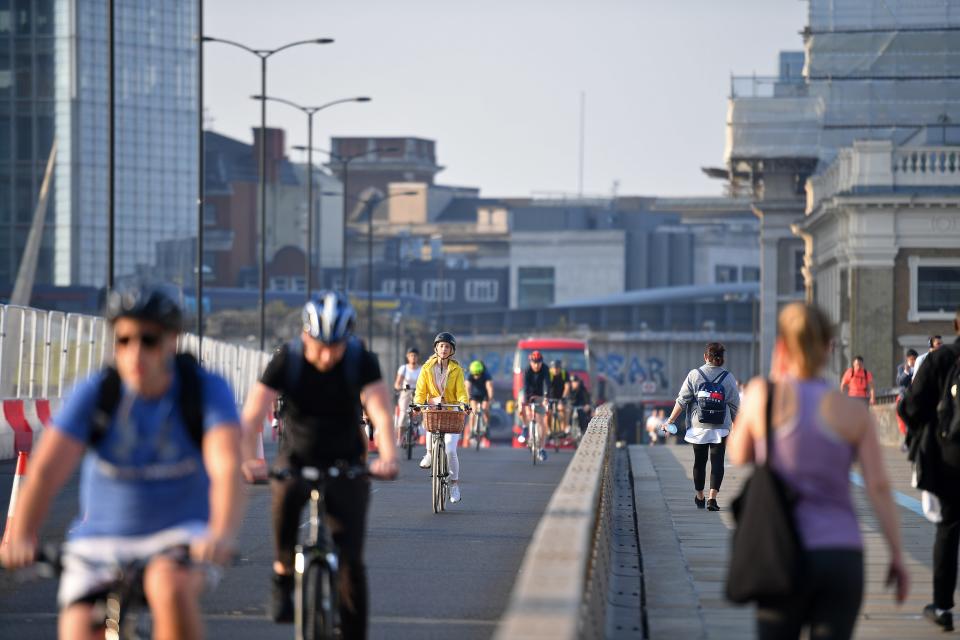 The IPPR recommends that town and city centres aim to be car-free by 2030, reallocating road space for walking and cycling (AFP via Getty Images)