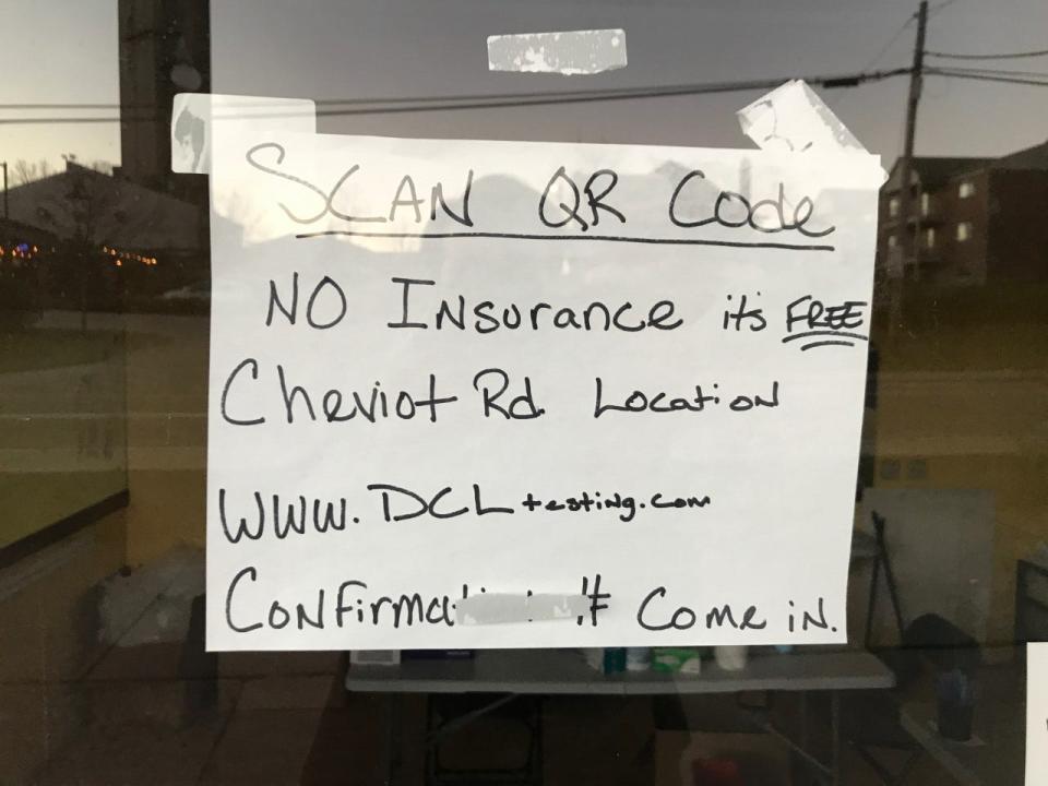 Sign on the door of the Center for COVID Control testing site in White Oak.