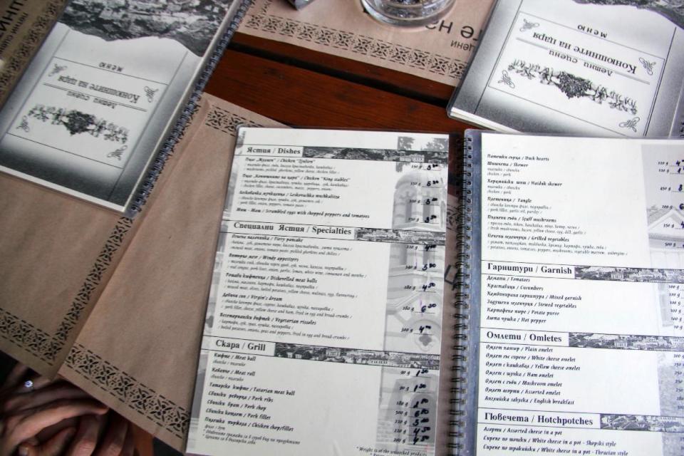 This Aug. 21, 2012 photo released by Mikhail Iliev shows menus with English translations in at a restaurant in Plovdiv, Bulgaria. (AP Photo/Mikhail Iliev)