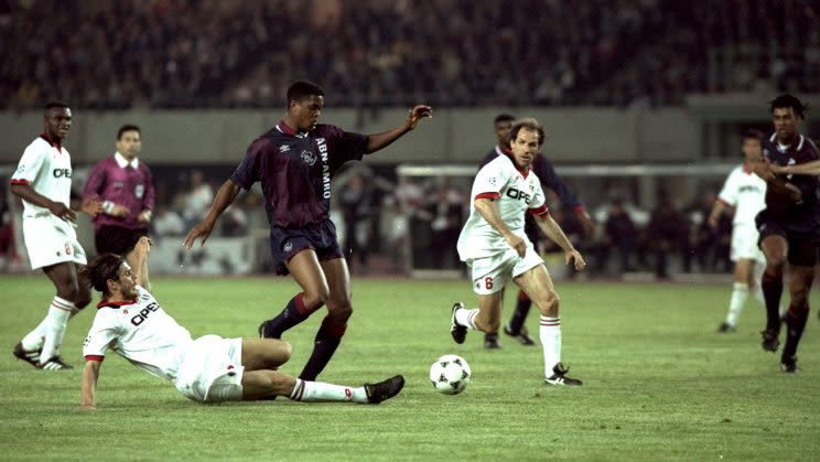 24 May 1995: Patrick Kluivert (centre left) of Ajax robs Franco Baresi (left) of AC Milan of the ball during the European Cup Final in Vienna, Austria. Ajax won the match 1-0. Mandatory Credit: Clive Brunskill/Allsport