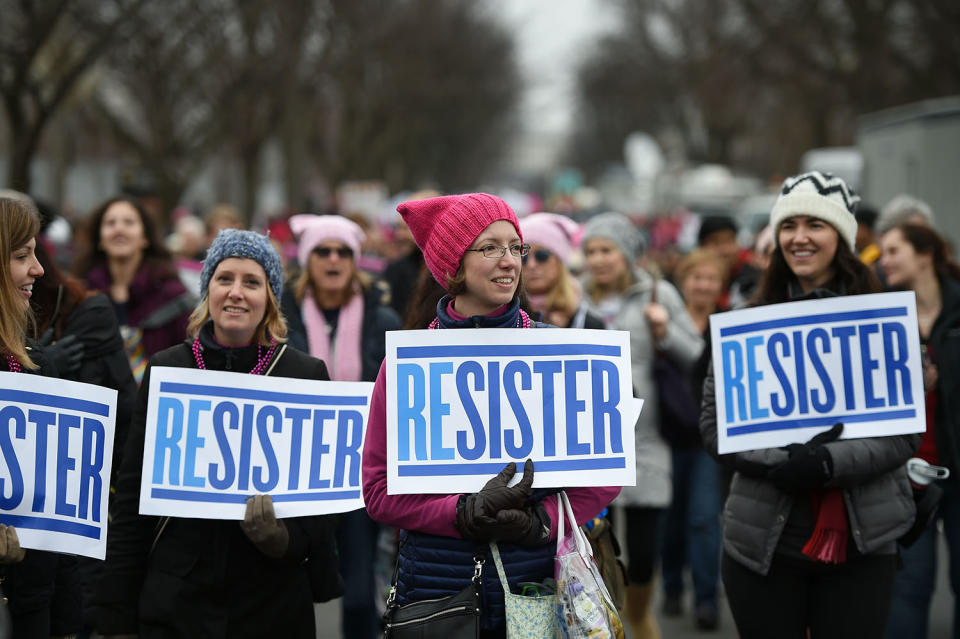 <p>Protesters march in Washington, DC, during the Womens March on January 21, 2017. (ROBYN BECK/AFP/Getty Images) </p>